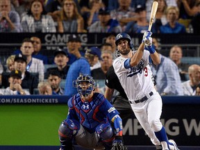 Chris Taylor of the Los Angeles Dodgers hits a solo home run to right field against the Chicago Cubs during the sixth inning in Game One of the National League Championship Series at Dodger Stadium on Oct. 14, 2017 in Los Angeles. (Kevork Djansezian/Getty Images)