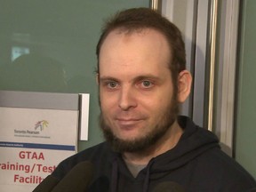 A grab taken from a video released by CBC News on October 14, 2017 shows freed Canadian hostage Joshua Boyle giving an interview upon his arrival at Toronto Pearson international airport. (AFP PHOTO / CBC NEWS)