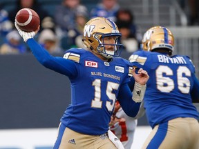 Winnipeg Blue Bombers quarterback Matt Nichols (15) throws during second half CFL action against the B.C. Lions, in Winnipeg, Saturday, October 14, 2017. (THE CANADIAN PRESS/John Woods)