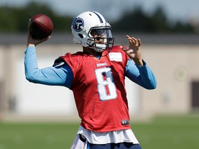 In this Oct. 4, 2017, file photo, Tennessee Titans quarterback Marcus Mariota throws during NFL football practice in Nashville, Tenn. The Titans are hoping Mariota’s hamstring continues improving enough for him to play Monday night against the Indianapolis Colts. (AP Photo/Mark Humphrey, File)