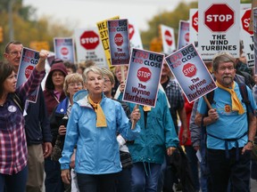 Residents march down Picton's Main Street during an anti-wind rally on Sunday October 15, 2017 in Picton, Ont. Tim Miller/Belleville Intelligencer/Postmedia Network