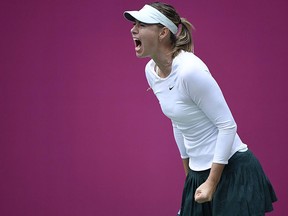 Maria Sharapova of Russia reacts after winning a point against Aryna Sabalenka of Belarus during the women's singles final at the Tianjin Open tennis tournament in Tianjin on Oct. 15, 2017. (WANG ZHAO/AFP/Getty Images)