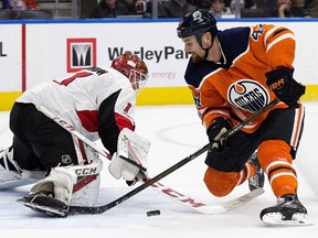 The Edmonton Oilers Zack Kassian (44) is stopped by the Ottawa Senators' goalie Mike Condon (1) during first period NHL action at Rogers Place on Saturday, Oct. 14, 2017.