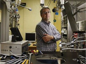 Carleton University experimental physicist Mark Boulay poses for a photo in Ottawa on Thursday. Boulay has just received $3.35 million to build a lab equipped with detectors to assist in the search for the elusive dark matter particle. (Tony Caldwell/Postmedia)