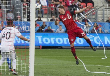 Toronto FC's Nicolas Hasler fails to connect on a header during Toronto FC's match on Sunday, Oct. 15, 2017. (Stan Behal, Toronto Sun)