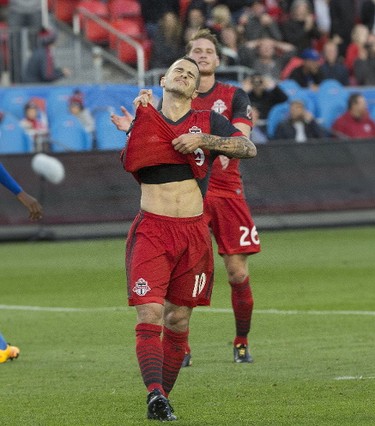 TFC's Sebastian Giovinco grimaces after missing a penalty during Toronto FC's match on Sunday, Oct. 15, 2017. (Stan Behal, Toronto Sun)