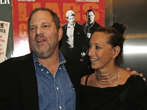 In this Aug. 22, 2007, file photo, Harvey Weinstein and Donna Karan arrive at the premiere of "The Hunting Party" at the Paris Theater in New York. Karan apologized on Monday, Oct. 9, 2017, after offering praise for Weinstein the night before following his firing from his company amid allegations of sexual harassment lasting decades. (AP Photo/Rick Maiman, File)
