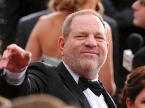 In this Feb. 22, 2015 file photo, Harvey Weinstein arrives at the Oscars at the Dolby Theatre in Los Angeles. On Saturday, Oct. 14, 2016, the Academy of Motion Picture Arts and Sciences revoked Weinstein's membership. The decision, reached Saturday in an emergency session, comes in the wake of recent reports by The New York Times and The New Yorker magazine that revealed sexual harassment and rape allegations against him going back decades.(Photo by Vince Bucci/Invision/AP, File)