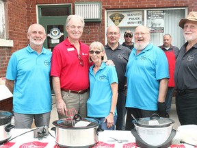 In the picture, from the left at the fifth annual Hamburger and Hotdog Barbeque is Tuckersmith Coun. Ray Chartrand, Wayne Smith, president of the board for United Way Huron-Perth, Janice Andrews, Huron East CAO, Brad Knight, Brussels Ward Councillor David Blaney and Seaforth Councillor, Bob Fisher. (Shaun Gregory/Huron Expositor)