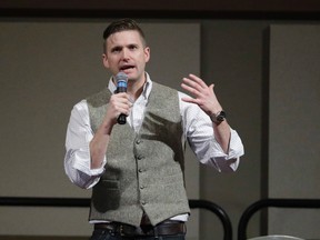 In this Dec. 6, 2016, file photo, Richard Spencer, who leads a movement that mixes racism, white nationalism and populism, speaks at the Texas A&M University campus in College Station, Texas. (AP Photo/David J. Phillip, File)