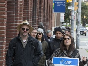 Striking faculty are pictured at George Brown College's King St. campus. (STAN BEHAL, Toronto Sun)