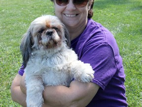 Nancy Ball, founder of CK Animal Rescue, is pictured in 2014 with her pet Shih Tzu Phoenix, who she rescued.