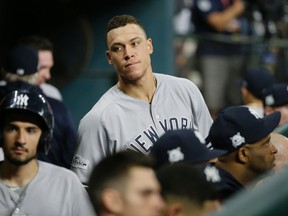 New York Yankees' Aaron Judge looks around the dugout during Game 1 of the ALCS against the Houston Astros on Oct. 13, 2017. (AP Photo/Tony Gutierrez)