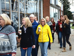 Local women take a walking tour to meet female entrepreneurs through downtown on Oct. 14 (Peter Shokeir | Whitecourt Star).