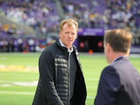 NFL Commissioner Roger Goodell walks off the field after warmups on Oct. 15, 2017 at US Bank Stadium in Minneapolis. (Adam Bettcher/Getty Images)