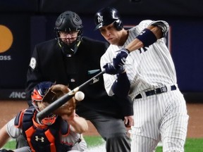 Yankees' Aaron Judge hits a three-run home run during the fourth inning of Game 3 of the AL Championship Series against the Astros in New York on Monday, Oct. 16, 2017. (Frank Franklin II/AP Photo)