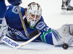 Vancouver Canucks goalie Jacob Markstrom has been in net for all four of Vancouver’s games this season, recording a 2.96 GAA and a .902 save percentage. (DARRYL DYCK/The Canadian Press files)