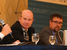 Geoff Fisher makes a point as Chris Laking looks on during the Greater Sudbury Chamber of Commerce leadership luncheon on proposed tax reforms in Sudbury, Ont. on Monday October 16, 2017. Gino Donato/Sudbury Star/Postmedia Network