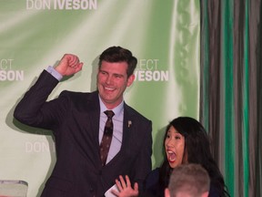 Edmonton Mayor elect Don Iveson speaks to his supporters at the Matrix Hotel after winning the Mayors chair for a second term  on October 16, 2017. By his side was his partner Sarah Chan. (Shaughn Butts / Postmedia)