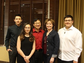 Stony Plain mayoral incumbent William Choy (centre) stands with his family at the Best Western in Stony Plain on election night 2017. Choy won re-election for second full term after defeating opponent and former Stony Plain councillor, Robert Twerdoclib, by 1,043 votes, according to unofficial polling results.