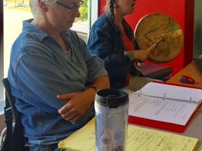 Cathy Elliott is seen here playing a drum. Beside her is her partner, Leslie Arden. Elliott was killed while walking near her home in Alliston on Sunday.