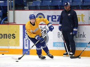 Sudbury Wolves head coach Cory Stillman watches while forward Owen Gilhula takes part in a drill during practice at Sudbury Community Arena on Tuesday, October 17, 2017. Gino Donato/The Sudbury Star/Postmedia Network