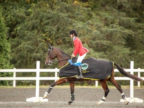 Selena O'Hanlon and Foxwood High (Woody) take their victory lap after capturing the Dutta Corp Fair Hill International CCI 3* title in Elkton, Md. (Supplied Photo)