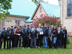 Members of ABATE Ontario gathered at St. Paul’s Anglican Church in Clinton on Saturday to present cheques to two local PTSD support organizations -- Huron Respite Network and The Stable Grounds.