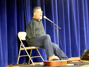 BRUCE BELL/THE INTELLIGENCER
Singer Tony Melendez (left) performed at Quinte Secondary School on Wednesday afternoon. Born with no arms, the guitar-playing Melendez delivered a message of hope and inspiration to the students.