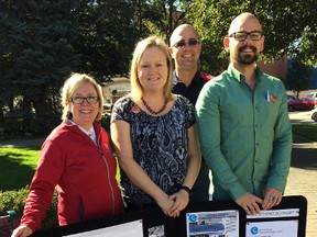 The Oxford County Community Health Centre marked Community Health and Wellbeing Week by reaching out to the community in Museum Square Wednesday. From left Major Naomi Dalley of the Salvation Army, Kathy Nyman, Trevor McLellan, and David Grand. (HEATHER RIVERS/SENTINEL-REVIEW)