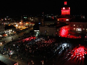 The community came together to celebrate and honour the life of Gord Downie with an impromptu candlelight vigil in Springer Market Square in Kingston on Wednesday night. (Julia McKay/The Whig-Standard)