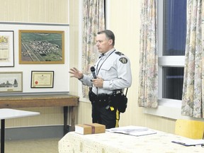 RCMP Cpl. Trent Sperlie spoke to over 150 people at the old Craigmyle school on Oct. 11 regarding their rights as property owners and citizens of Alberta. Sperlie noted that while there is a level of expectation to privacy at ones house, if you have a large track of land it would be best to put up No Tresspassing signs to ensure unwanted visitors stay away. Jackie Irwin/ Hanna Herald