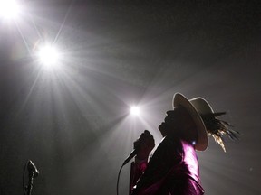 Chad Hipolito/THE CANADIAN PRESS
The Tragically Hip's Gord Downie, performs during the first stop of the Man Machine Poem Tour at the Save-On-Foods Memorial Centre in Victoria, B.C., Friday, July 22, 2016.