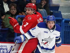 Darian Pilon of the Sudbury Wolves pins Anthony DeMeo of the Soo Greyhounds during OHL action from the Sudbury Community Arena in Sudbury, Ont. on Wednesday October 18, 2017. Gino Donato/Sudbury Star/Postmedia Network