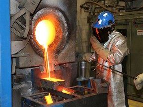 Gold refiner Gilles Godmaire adjusted the tilting of the ore furnace at Tahoe Canada’s Bell Creek mill this week as the gold bar containing the one-millionth ounce of gold was poured. It was eight years ago that Lake Shore Gold, now known as Tahoe Canada, went into production in Timmins. The million-ounce milestone was celebrated Thursday morning. LEN GILLIS / Postmedia Network