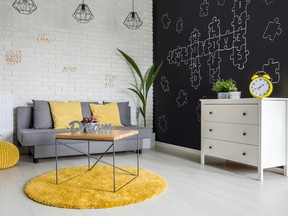 The dark wall works well with the yellow details. (Photos by Getty Images/iStock Photo)