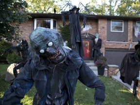 Damien Gallagher?s London home at 101 Dearborn Ave. comes alive with ghoulish characters he?s been creating for 17 years to celebrate Halloween. (DEREK RUTTAN, The London Free Press)