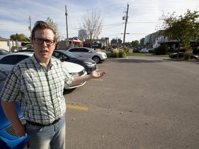 Mike Bloxam, president of the London chapter of the Architectural Conservancy of Ontario, says Farhi Holdings? refusal to sell or build on temporary parking lots is hurting downtown development. (MIKE HENSEN, The London Free Press)