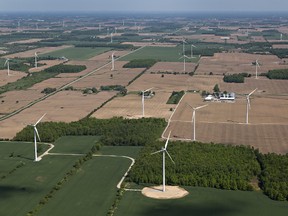 Wind turbines dot the landscape near Port Dover. The Ontario government is backing away from expanding wind power capabilities due to a public backlash over rising energy bills. (Postmedia file photo)
