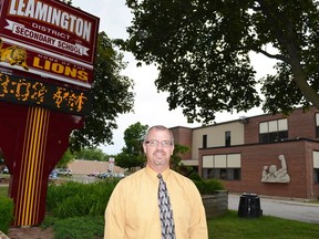 Principal Mike Hawkins stands outside the old Leamington District secondary school. A reunion last week for former Leamington District students included columnist Larry Cornies, who says the event produced candid and forthright exchanges, a lack of pretence and, perhaps for the first time, a sense that ?we were genuinely mindful of the moment.? (Postmedia file photo)