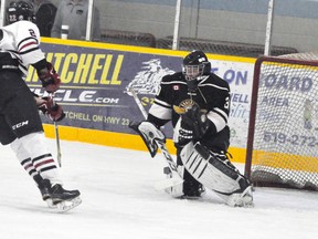 Jamie Shoemaker (22) of the Mitchell Hawks scores his first of two goals over the shoulder of Goderich Flyers’ goalie Brandon Bean during PJHL Pollock division regular season action last Wednesday, Oct. 18. Mitchell won 7-2. ANDY BADER/MITCHELL ADVOCATE