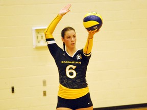 Cambrian College Golden Shield's Amanda Kring sets up for a serve during women's OCAA volleyball action at Cambrian College earlier this season. Keith Dempsey/For The Sudbury Star.