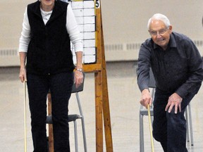 Longtime shuffleboarders Ellen Illman (left) and Ken Rolph enjoy the social aspect every time out. ANDY BADER/MITCHELL ADVOCATE