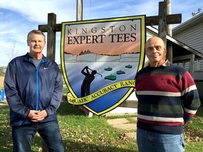 Jim Fehr, left, the new co-owner of Kingston Expert Tees and former owner and founder Pierre Dube at the local aquatic golfing range in Kingston. (Mike Norris/The Whig-Standard)