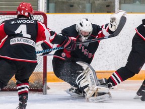 Tim Gordanier/The Whig-Standard
Picton Pirates goaltender Wesley Werner kicks out his right pad to make one of his 44 saves as he backstopped the Pirates to a 5-1 win over the Amherstview Jets in a Provincial Junior Hockey League game Sunday night in Amherstview.