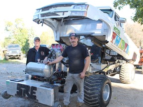 A hidden gem can be found just down the road in Holyrood Ontario and it's a truck built from the ground up by Dave Rutledge. Mister Twister is the monster truck that has the competition running in the Southwestern Ontario Pullers Associations 4x4 truck pull class. Pictured: L-R: Murray Barr and Dave Rutledge put things in perspective when it comes to the shear size of their Mister Twister power truck. (Ryan Berry/ Kincardine News and Lucknow Sentinel)