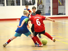 Children play indoor soccer during at the Allan and Jean Millar Centre on Oct. 19. Whitecourt Minor Soccer began its season of indoor soccer in October to allow children to play the sport well into the winter (Peter Shokeir | Whitecourt Star).