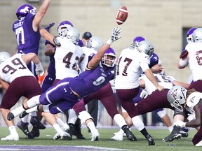 Western Mustang Myles Manalo almost blocks a field goal kick by Lewis Ward of the Ottawa Gee Gees at TD Stadium in London, Ont. on Saturday October 21, 2017. The Mustangs won the game 63-10. (DEREK RUTTAN, The London Free Press)