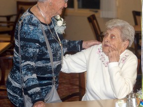 Shirley Deacon, left, Martha Modde have a conversation during Park Street Place retirement home's 30th anniversary celebrations held on Oct. 12.