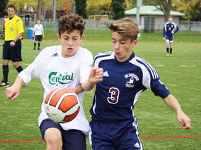 Bay of Quinte junior boys soccer semi-final action Tuesday at MAS 2 between Centennial (white jerseys) and St. Theresa. Chargers won, 2-1. (Submitted photo)